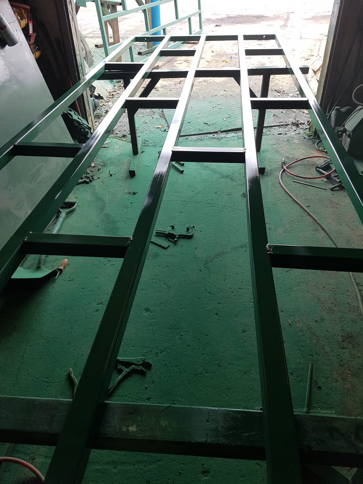 Steel frame sections in workshop