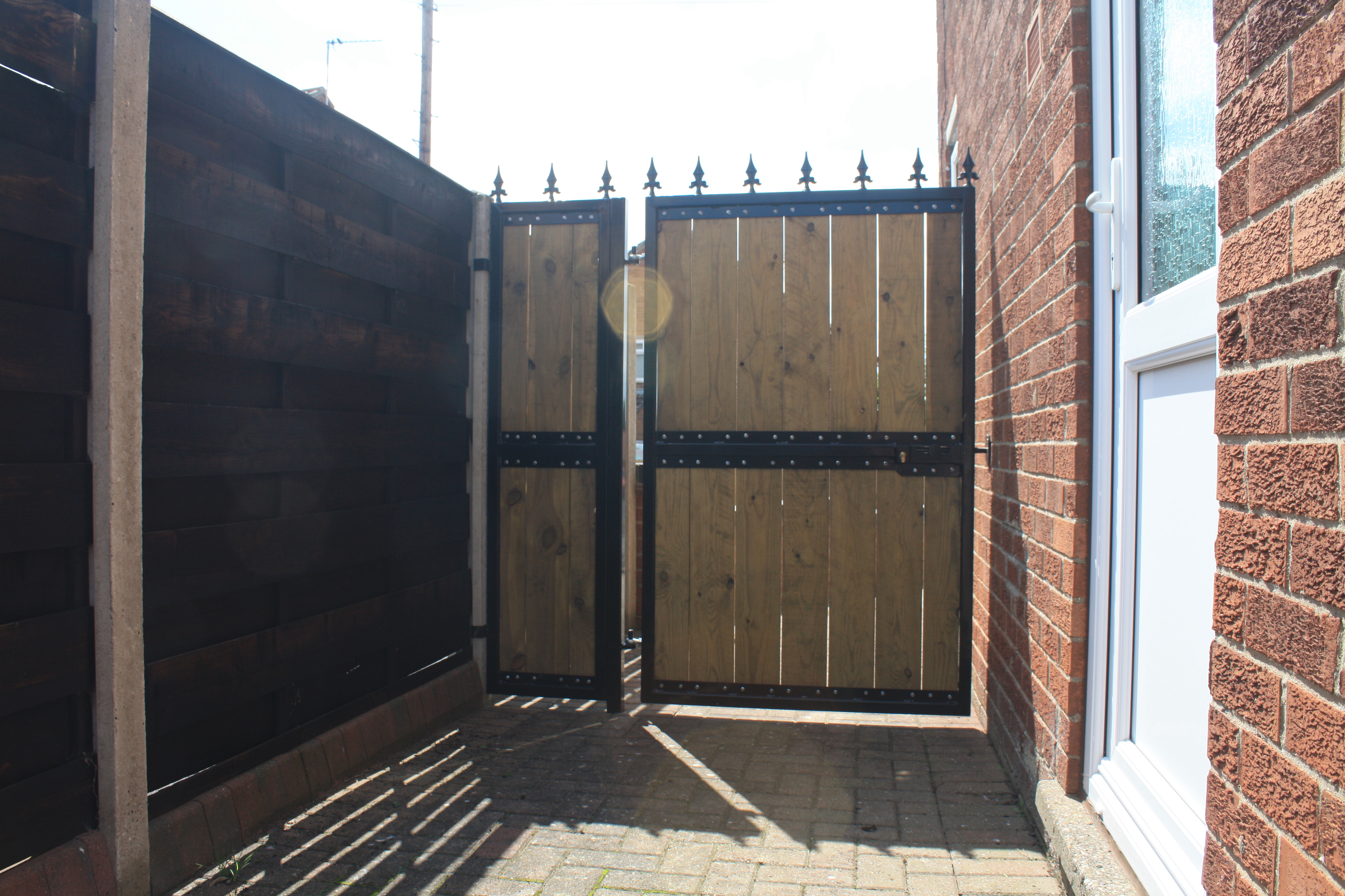 Steel and timber side gate — rear view